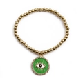 Pulsera de cuentas doradas con colgante de ojo turco en esmalte verde y circonitas - Verde