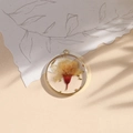 Handmade golden circular resin pendant with real yellow dried flowers and gold leaf - Light Yellow/Gold