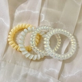 Set di 4 elastici a spirale perlati e iridescenti per capelli in crema e bianco - 8# Mix Giallo Radioso (Sacchetto da 4 pezzi)