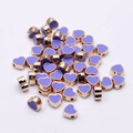 Macro detail of lavender heart enamel beads with gold plating for DIY jewelry - 8mm / Dark Violet
