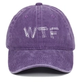 Close-up of vintage purple washed cotton baseball cap with white WTF letter embroidery - One Size / Purple