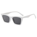 Fashionable white cat-eye sunglasses with dark lenses shown from a 45-degree angle - Solid White Frame Grey