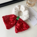 Detail of Christmas scrunchie with white faux fur and red sequined bow accessory - Red Sequins Bow