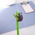 Cute brown sloth hugging a green branch shaped gel pen with 0.5mm black ink - Dark Coffee Sloth / 0.5mm Black Ink