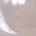 Detail of golden moon and flower suncatcher featuring natural purple amethyst crystals - Style 4-Floral Celestial Amethyst Pendant