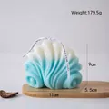 Shell-shaped scented candle in blue gradient finish on an oval wooden tray - Wave Pattern 1 / Blue