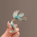 Elegant gold and blue phoenix brooch pin with sparkling rhinestone details for women - Blue