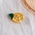 Elegant lemon hair clip in yellow marble texture acetate with green leaf detail - Lemon