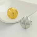 Minimalist textured titanium steel rings in gold and silver finish on display - Round Crumpled Stripe / Silver
