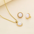 Detailed view of pearl-inlaid gold twist chain necklace and matching stud earrings set - Gold 2-Piece Necklace Earrings Set (KS223086-GC) / Gold