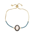 Adjustable gold bracelet with Virgin Mary charm and blue zircon stones for women - Blue
