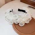 Cerchietto elegante in rete color crema con fiori e perle decorative per un look chic - Stile Fiore in Perla di Rete Crema
