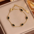 Elegante pulsera chapada en oro con cinco piedras negras de marquesa y cierre de langosta - Oro Circonita Negra