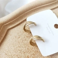 Minimalist geometric twisted gold hoop earrings in matte finish on a silver 925 jewelry card - Silver Pin-Geometric / Matte Gold