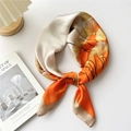 Elegant square silk scarf featuring orange and gold ginkgo leaf pattern on satin fabric - Orange Ginkgo Leaf