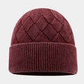 Close-up of wine red knitted beanie showing diamond texture and ribbed cuff detail - Burgundy