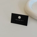 Minimalist black round bead stud earrings displayed on a professional jewelry card - Black Gold Plated