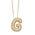 Detailed close-up of a gold G-letter pendant necklace fully paved with sparkling zircons - Gold - Letter G (Pendant Only)