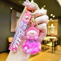 Close-up of pink pig bubble bottle keychain with floating glitters and a soft strap - Gradient Rope [rose Red] Glow-in-the-dark Pvc Peach Pig