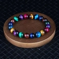 Vibrant multi-color tiger eye beaded bracelet featuring blue, purple and green natural stones - Rainbow