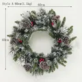 60cm Christmas wreath with green pine needles, white snow frost, pine cones and red berries - Style A 60cm