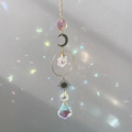 Golden sun catcher with moon and crystal prisms casting colorful rainbow reflections - Maple Leaf Pattern