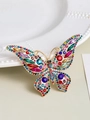 Golden butterfly brooch with multi-color rhinestones and faceted gems in a floral style - Multicolored Butterfly