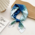 Blue and white gradient silk square scarf tied on a wavy wooden tray for styling - Sea Wave Blue