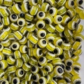 Detailed close-up of bulk yellow evil eye beads for handmade jewelry DIY necklaces - Light Yellow / 10mm