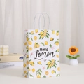 White kraft paper shopping bag with yellow lemon prints and twisted paper handles - 410-2/Hello Lemon Text