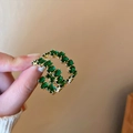 Handheld view of elegant double-hoop earrings featuring vibrant green emerald-style gemstones - Double Ring Rhinestone Style (8#) / Green