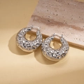 Detailed view of silver hoop earrings with unique hammered texture and metallic finish - Vintage Irregular Hammered Chunky Hoop Style (5#)