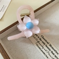 Pink organza flower hair claw clip with blue pearl center on a wooden jewelry tray - Light Pink Flower Claw Clip (150#)
