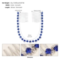 Silver bridal hair comb featuring elegant blue rhinestones and crystal chain detail - Gold + Royal Blue