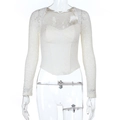 Detailed lace texture on a white long sleeve corset top with sweetheart neckline - S / Off White