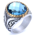 Detail showing vintage ring with large blue gemstone and ornate engraved silver band - Two-Tone Gold + Blue Gemstone