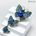 Vintage butterfly brooch set in antique gold with blue rhinestones and crystals - Style 70/Long Blue Butterfly