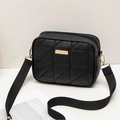 Minimalist black quilted crossbody camera bag with gold hardware and wide strap - Black