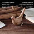 Minimalist resin bird figurine with wood grain texture and white hand-painted lines - Cock-tailed Bird