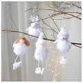 Close-up of plush angel and reindeer ornaments hanging on branches with warm light - Plush Series 4-Piece Set