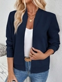 Detailed close-up of navy blue jacket with textured geometric diamond knit pattern - S / Navy Blue