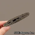 Diamond-encrusted star hairpin in dark grey rhinestones on a black base, 8cm long - Approx. 8cm / Grey Rhinestone Bar