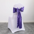 White stretch chair cover with a purple satin ribbon tied in a decorative bow for banquets - Deep purple