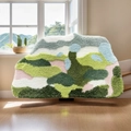 Irregular tufted bathroom mat with 3D green mountain landscape and plush texture - Field