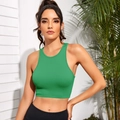 Slim fit green ribbed knit sports tank top for women, perfect for yoga and fitness training - Grass Green