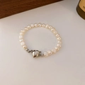 Elegant baroque freshwater pearl bracelet featuring a minimalist heart-shaped silver clasp - White Magnetic Heart Style (5145007714146) / Silver/Cream White