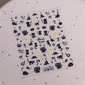 Stickers ongles chat noir TS-3781 avec étoiles et empreintes sur fond blanc à pois - TS-3781 Journal du Chat Noir