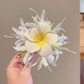 Elegant white mesh flower hair clip with a yellow gradient frangipani design - White Lycoris