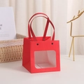 Red kraft gift bag with window and smiling eye design plus black handles for birthdays - Open Window Red 10x10x10cm