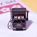 Mini black lucky slot machine keychain with a red lever and 777 fruit jackpot graphics - Colorful Black D-ring / Minimum Order Of 5 Pieces